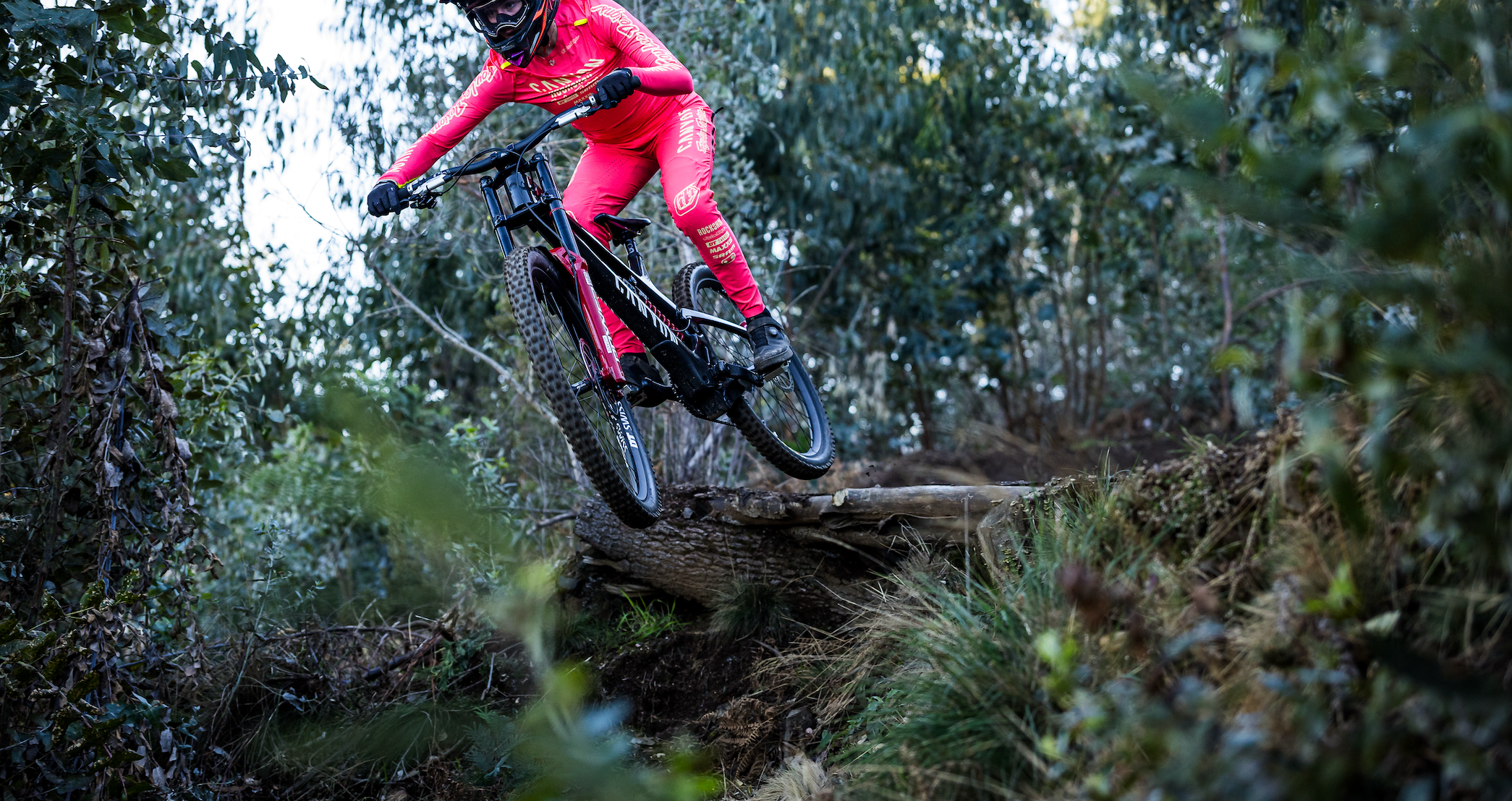 New Canyon Sender downhill bike on a forest trail.