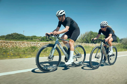 Two road cyclists are riding on the new Canyon Endurace bikes.